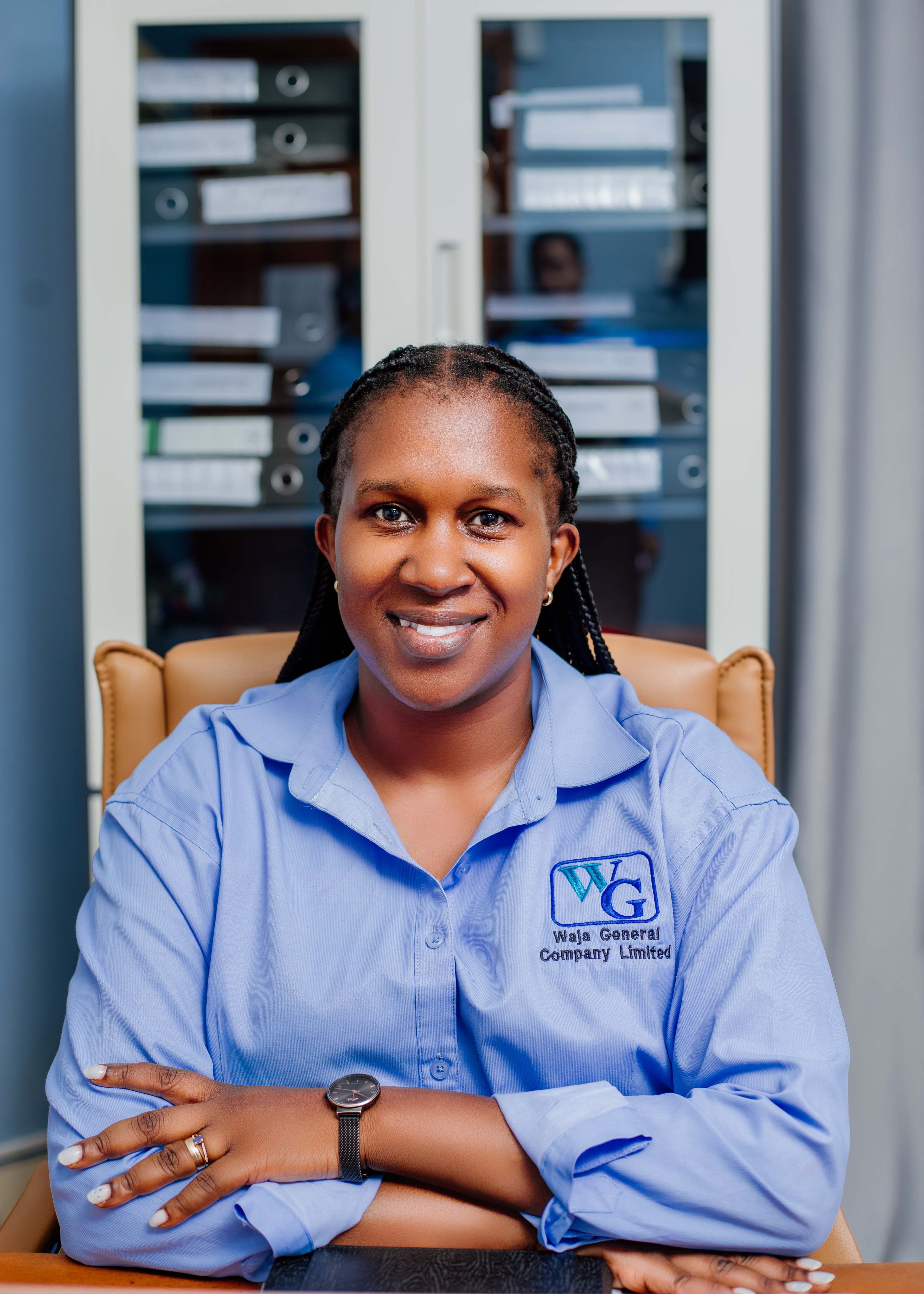 Waja General manager seated for an official portrait
